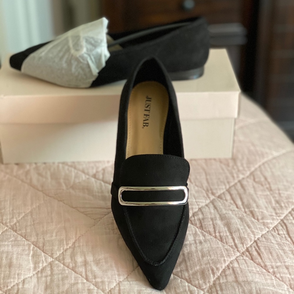 Pointed black loafers